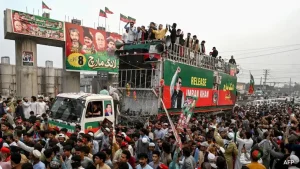Thousands of Khan's supporters have been marching in Khyber Pakhtunkhwa province to demand