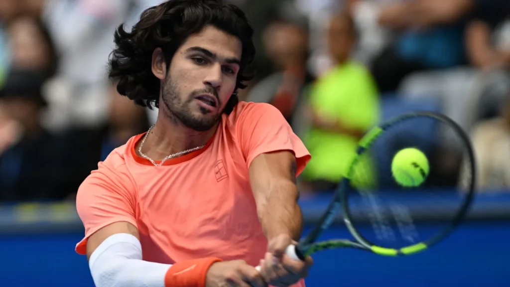 Carlos Alcaraz qualified for the semi-finals of the Japan Open on Sunday after an ailing Denis