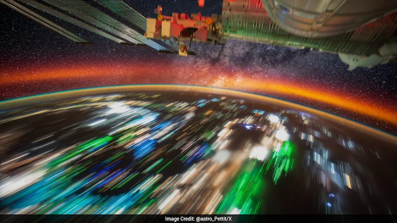 Astronaut Shares Rare Milky Way View From Space With Red Atmospheric Band