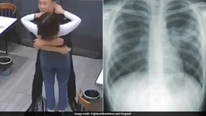 Because her husband hugged her, Singapore-based media outlet Mothership reported, a woman