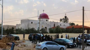 Gunmen opened fire during a funeral at a church in Jordan on Friday, killing seven people